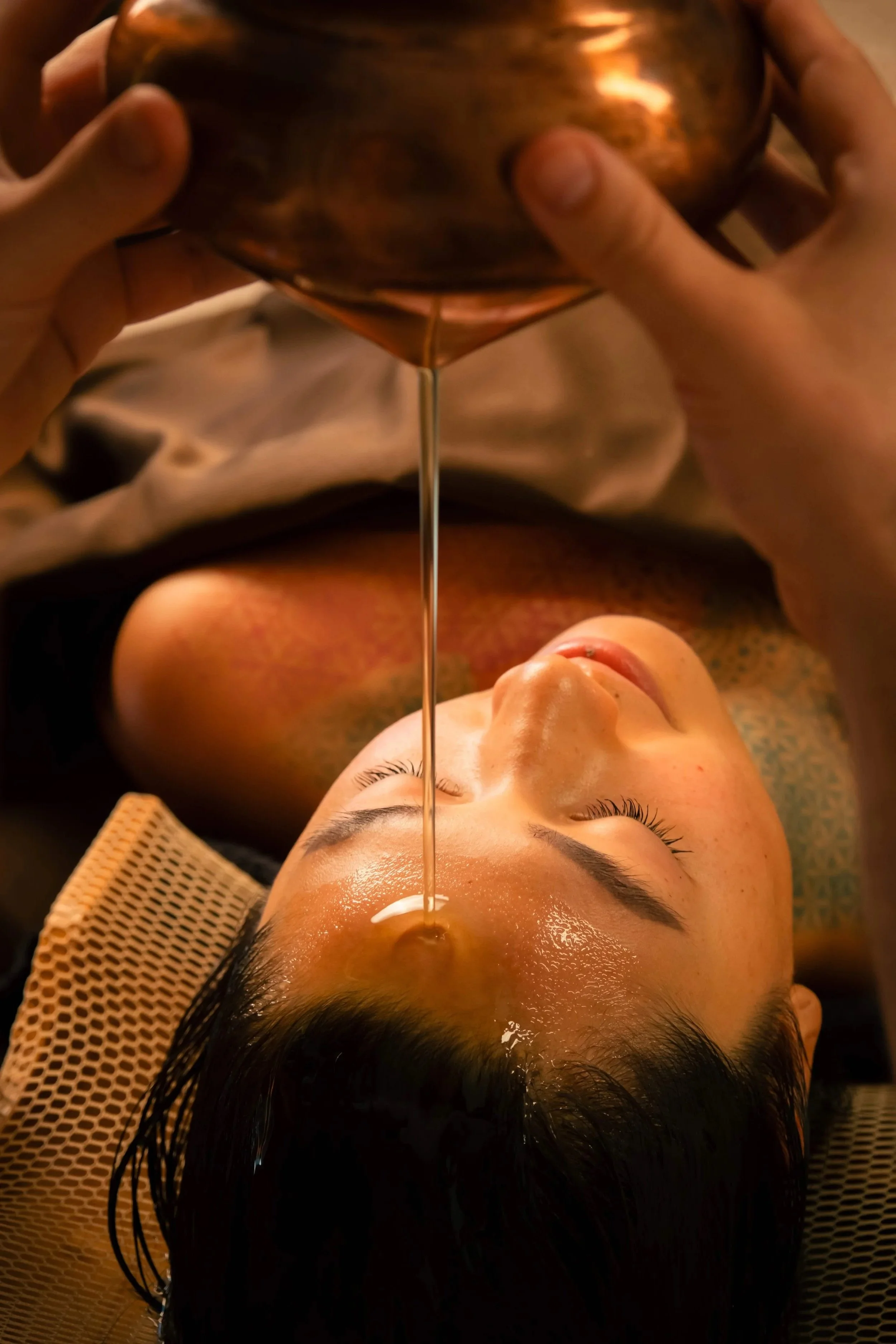 Shirodhara warm oil stream